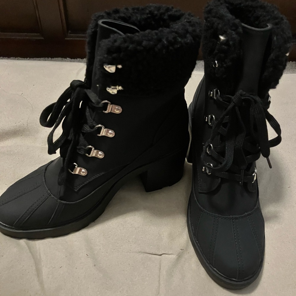 Black ankle boots. Never been worn.